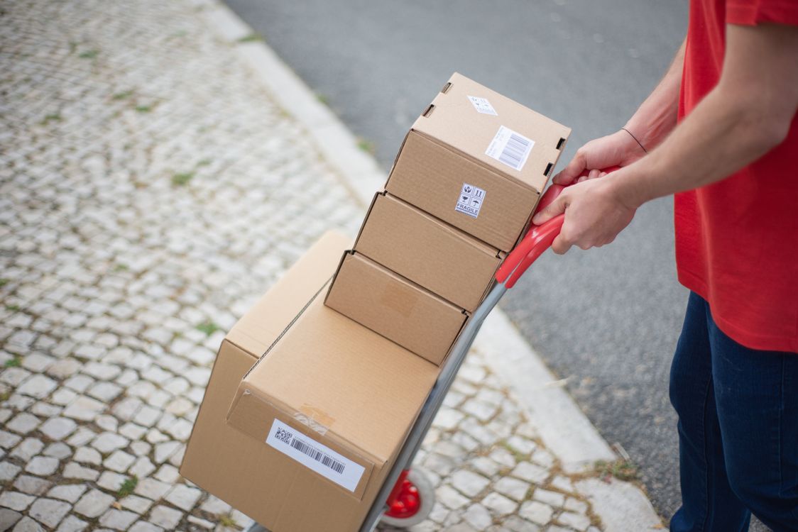 courier handling packages for delivery